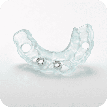 Dental implant surgical guide for precise placement in dental procedures.
