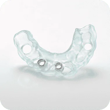 Dental implant surgical guide for precise placement in dental procedures.